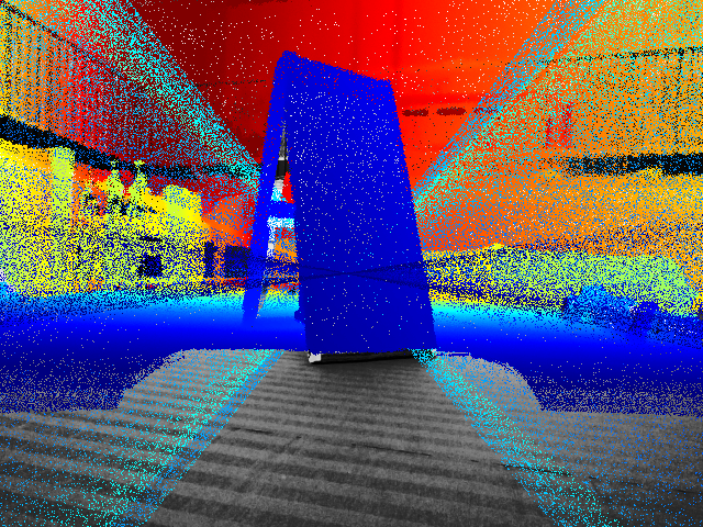 LiDAR points projected onto the camera photo and coloured by depth; a plywood board's point-cloud silhouette lands exactly on the board's outline